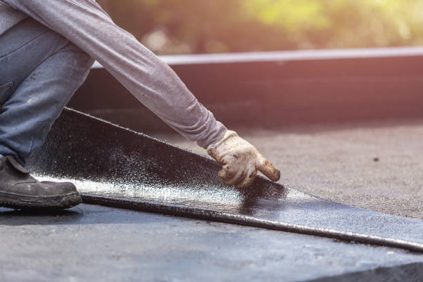 Professional Basement Waterproofing technician working in Melrose Park, NY